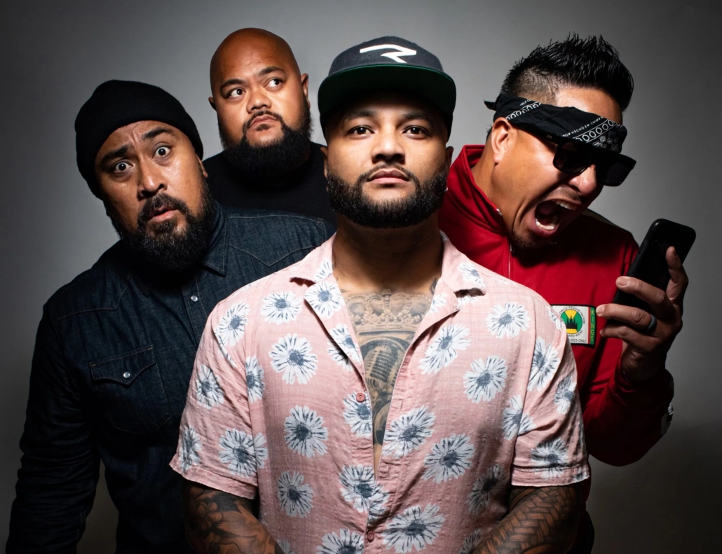 Band photo of Common Kings, four men posing together.